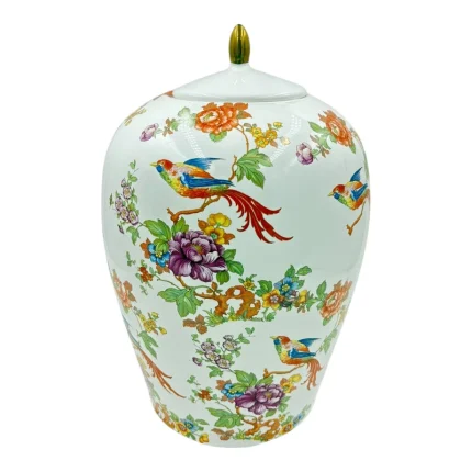 بانکه شیک با طراحی گل و طوطی‌های رنگارنگ و دستگیره طلایی زیبا.